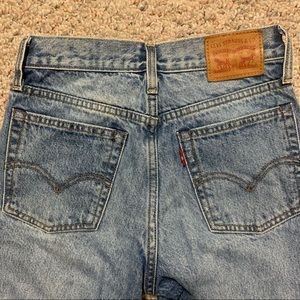 Size 24 (00) Levi’s denim jeans, I believe they are “wedgie fit”.